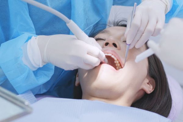 Woman undergo dental check up